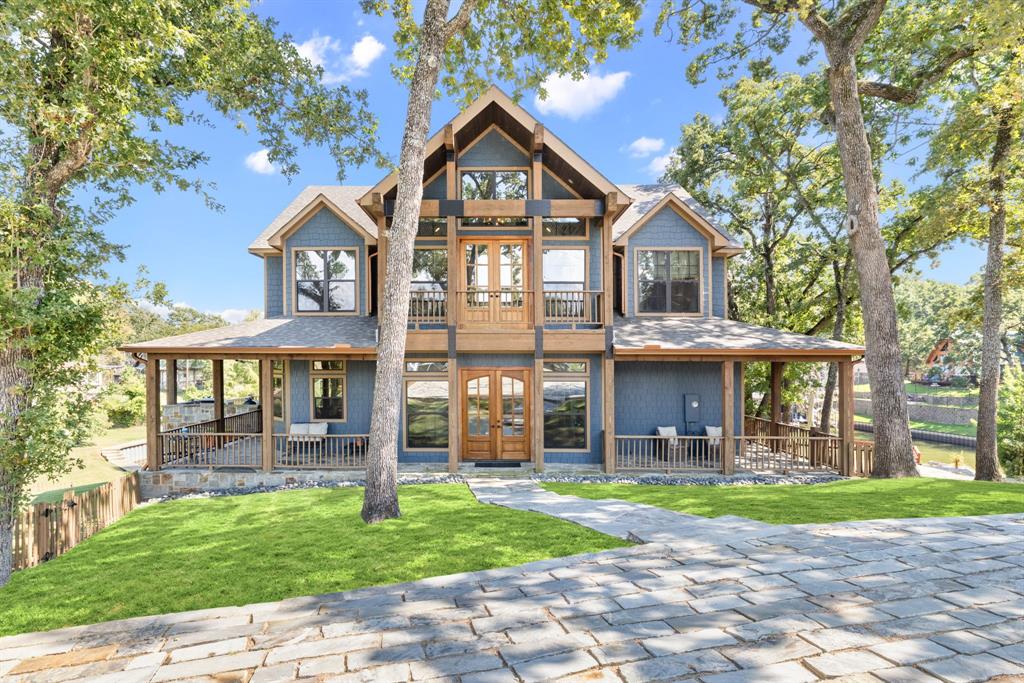 Set on the coveted shores of Cedar Creek Lake, this five-bedroom, three-and-a-half bath masterpiece redefines lakefront living with 2,933 square feet of refined comfort and style. Showcasing rustic elegance at its finest, the home features dramatic ceilings, striking wood and stone accents, and an open floor plan wrapped in windows that capture dazzling water views from every angle.
Designed for both grand entertaining and relaxed living, the residence offers multiple patios, a wraparound porch, and an expansive backyard anchored by a lakeside firepit. Whether hosting sunset dinners by the built-in outdoor grill, enjoying morning coffee on the porch, or gathering under the stars, every moment here feels like a private retreat.
Direct access to the water elevates the experience, with a private boat ramp and dock offering endless opportunities for boating, fishing, and waterfront leisure. After a day on the lake, retreat to your serene patios or welcome guests with ease thanks to ample parking and thoughtfully designed outdoor spaces.
Rarely does a home of this caliber become available—combining rustic charm, modern luxury, and unrivaled lakefront access in one of the area’s most desirable settings. Perfect as a year-round residence or a luxurious getaway, this property represents the pinnacle of Cedar Creek living.