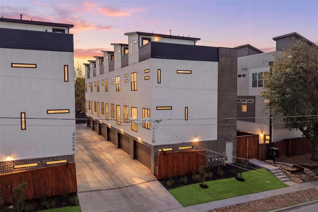 This exclusive development in a trendy, urban area showcases 11 modern townhomes, each featuring 2 bedrooms and 2.5 bathrooms, situated in a
sought-after residential area with gated entry and secure access. The open concept floor plans are flooded with natural light from oversized Andersen
windows throughout. Engineered oak hardwood flooring spans all living levels, complemented by solid core doors and custom millwork. Each home comes pre-wired for an integrated speaker system and high-speed internet. All units offer spray foam insulation, ensuring energy efficiency throughout the year, and keeping electric bills at a minimum! The kitchens feature custom cabinetry with designer hardware, quartz countertops and a full stainless steel appliance package from the Frigidaire Gallery series. A large eat-in island provides additional storage and is an ideal space for more casual dining. Each townhome features a private rooftop deck with artificial turf and downtown skyline views, perfect for outdoor gatherings, enjoying your morning coffee, or hosting happy hour! Attached garages offer epoxy flooring and extra built-in storage. All 11 townhomes are available for portfolio purchase, presenting an exceptional opportunity for investors seeking rental income or short-term rental returns in a high-demand urban market.

Please note: Photography may represent a model unit with comparable finishes and floor plan.