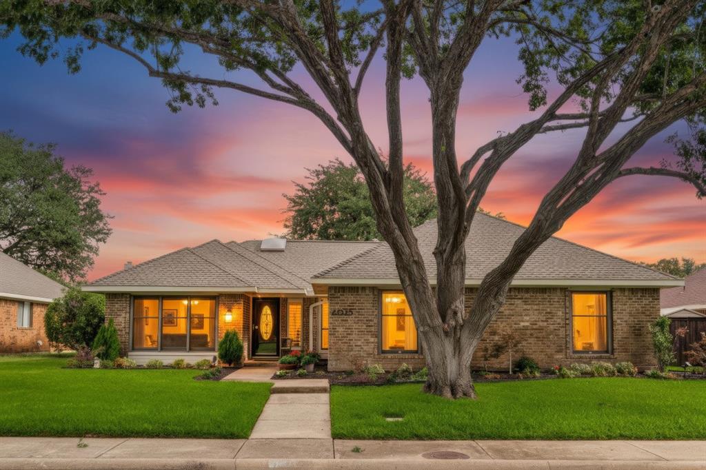 Located in Plano ISD and in move in Ready condition.  This home has been beautifully updated, this light-filled home offers designer style in every room. Sunlight pours through large windows across the entire floor plan, highlighting the raised and vaulted ceilings and the fresh, modern color palette.  The chef-inspired kitchen features custom full overlay cabinets and stunning Quartz countertops, high-end stainless-steel appliances including double ovens, microwave, dishwasher, plus designer lighting that elevates the whole space. Both bathrooms are equally updated with Quartz counters and contemporary finishes.  Relax in the 7-foot luxury soaking tub in the oversized Master Bath.  With four spacious bedrooms, this home provides a wonderfully flexible layout—ideal for guests, a home office, or multigenerational living. Each bedroom is generously sized, offering comfort and privacy rarely found at this price point.  Step outside to enjoy mature trees, lush landscaping, and peaceful outdoor spaces in both the front and back yards. The back yard features a freshly stained board on board fence.  From your doorstep, it’s an easy walk to a nearby park featuring a beautiful pond with ducks and geese, perfect for morning strolls or evening relaxation.  This home blends modern updates, natural light, and a fantastic floor plan—all in a move-in-ready package.