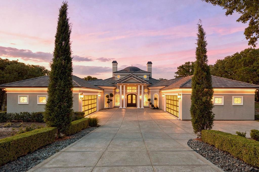 In the prestigious golf course community of Tour 18, this exceptional, newly remodeled home offers refined luxury and privacy unparalleled. Nestled on a beautifully landscaped back lot, the home showcases an impressive open-concept floor plan with seamless flow into spacious living and dining areas, perfect for entertaining. High ceilings and abundant natural light flood each room. Modernized touches like newly renovated bathrooms, new hardwood floors and updated paint and lighting offer a breath of fresh air to new homeowners. The private primary suite is a true retreat with a spa-inspired bath and a generous walk-in closet. With richly appointed secondary bedrooms across the first floor, a dedicated office space or wine room, media or game room, and meticulously crafted indoor-outdoor living areas, hosting is a must. Enjoy tranquil evenings in the backyard oasis complete with a sparkling pool, covered patio, and  private landscaping. Located within highly acclaimed schools and minutes from shopping, dining, and DFW Airport, this remarkable property combines luxury, comfort, and convenience in one of Flower Mound’s most sought-after neighborhoods.