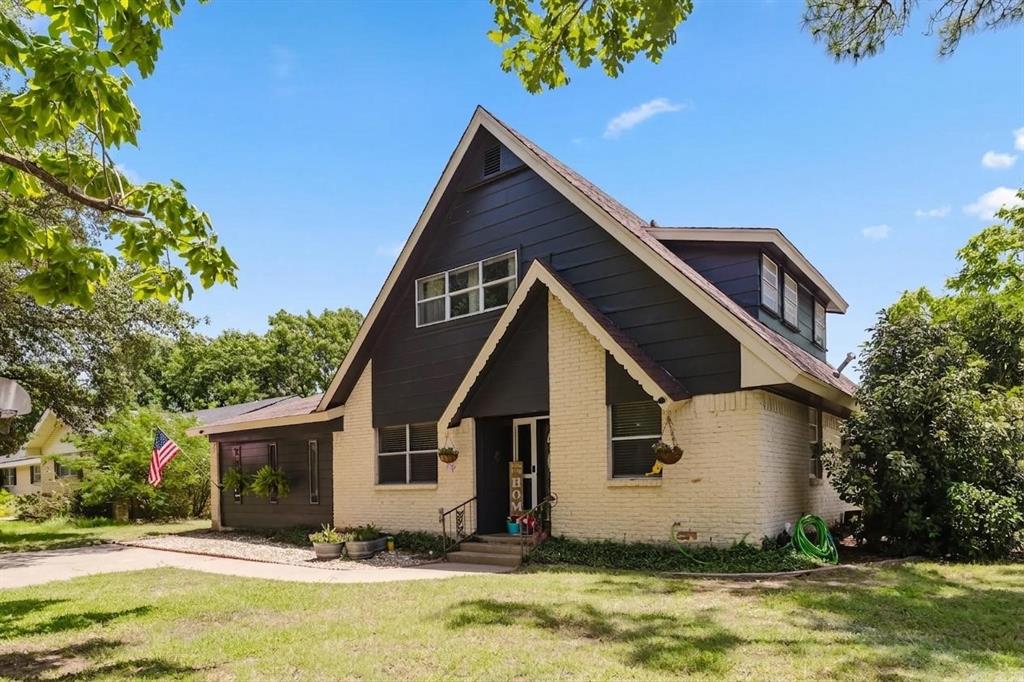 Some homes just feel welcoming the moment you pull into the driveway, and this is one of them. Nestled beneath beautiful mature shade trees in an established Eastland neighborhood, this charming 3-bedroom, 2-bath home offers 1,890 square feet of comfortable living with the perfect blend of character and modern updates. Inside, you'll find spacious living areas, updated flooring, a cozy wood-burning fireplace, and an open layout that makes everyday living and entertaining effortless. The kitchen offers plenty of cabinet and counter space, a breakfast bar for casual meals, and flows seamlessly into the dining area, where French doors lead out to the back deck; perfect for morning coffee, weekend barbecues, or simply unwinding after a long day. Upstairs provides additional flexibility for a guest room, home office, or hobby space. Outside, the large backyard offers plenty of room to play, garden, or entertain under the shade of mature trees. Conveniently located just minutes from schools, shopping, restaurants, and everything Eastland has to offer, this move-in-ready home is full of warmth, charm, and space to make memories for years to come.
