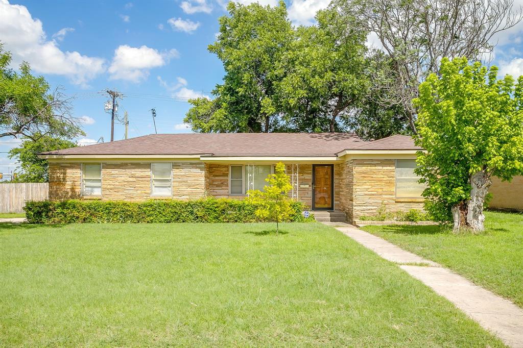 Rare opportunity to own a charming 1956 rock home with a 20x30 workshop, RV parking with hookups, and a spacious corner lot in a quiet, estabilished neighborhood! This well maintained 3 bedroom, 2 bath, 2 car garage home offers 1,411 sq ft of living space and sits on a spacious .29 acre corner lot. Original wood floors flow throughout most of the home, complemented by wood laminate flooring in the remaining areas, creating a warm and inviting atmosphere. The comfortable living spaces are perfect for everyday living with a tankless water heater and remodeled kitchen. The large covered back porch provides an ideal setting for entertaining family and friends.  The fenced backyard offers plenty of room to enjoy outdoor activities and features an impressive 20x30 workshop with electricity, plus an attached 13x13 storage shed perfect for hobbies, projects, or additional storage. RV owners will appreciate the dedicated RV carport with hookups and separate gated entry for convenient parking and easy access.  Conveniently located near shopping, schools, churches, and major employers including Lockheed Martin and the Naval Air Station Joint Reserve Base, this property combines timeless charm, practical amenities, and an exceptional location. Don't miss this opportunity to own a versatile property with space for all your needs!