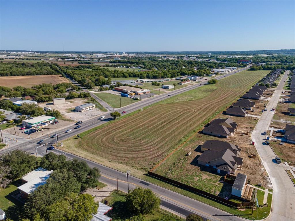Zoned RC (Commercial)... 4.2 acres listed; several additional acres available adjacent to this property with a great road frontage on Kilpatrick Road. Property begins on the corner of Granbury and Kilpatrick and continues down Kilpatrick. Nice flat land ready for development. Pictures show 4.2 acres listed and additional view of acreage available for your next commercial project in Cleburne. Seller willing to sell additional adjacent acreage (see MLS 20823211).