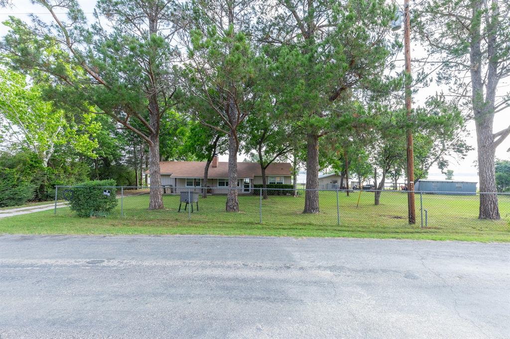 3 bedroom, 2 bath lake house offering the perfect blend of comfort, space, and waterfront living. Enjoy lake access with a private dock, plus multiple out buildings ideal for storage, hobbies, or workshop space. The spacious property provides plenty of room to relax, entertain, or enjoy the outdoors. Whether you’re looking for a weekend retreat or full-time residence, this property delivers peaceful lake living with endless potential.