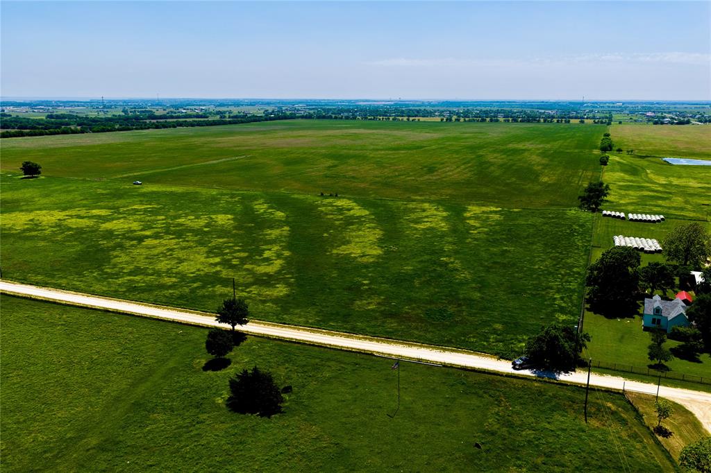 Valley View Prairie  50± Acres  Cooke County, TX

Highlights:
Approximately 50 acres in Cooke County, TX
Approximately 691 feet of County Road 204 frontage
Just 2 miles from I-35
No known floodplain
Electricity available at road
Bolivar Water nearby
Ag exemption currently in place
Productive hay and grazing ground
Mostly flat terrain
Tree-lined boundaries for privacy
Strong development and investment potential
Seller to include certain temporary restrictions with sale
Offered at $2,000,000 ($40,000 per acre)

Located just 2 miles off I-35 in the growing Valley View corridor of Cooke County, this clean and highly usable 50± acre tract offers an excellent opportunity for investment, development, agricultural use, or a private estate. With approximately 691 feet of frontage on County Road 204, the property combines strong access, nearby utilities, productive pastureland, and long-term upside in a growing North Texas corridor.

The land is mostly flat with a gentle roll, making it functional for a variety of uses. Currently utilized for hay production and grazing, the property benefits from productive soils, quality native and improved grasses, and an existing ag exemption. Tree-lined boundaries provide natural privacy while maintaining a high percentage of usable acreage.Unlike many tracts in the area, the property has no known floodplain, enhancing both usability and future development potential. Electricity is available along County Road 204, and Bolivar Water is located near the northwest corner of the property (buyer to verify availability and capacity).

Positioned less than 5 miles from Valley View, approximately 22 miles from Denton, 15 miles from Gainesville, and roughly one hour from Dallas, the tract is strategically located in a corridor experiencing continued residential and investment growth. Nearby ownership and development activity further support the area’s long-term trajectory.