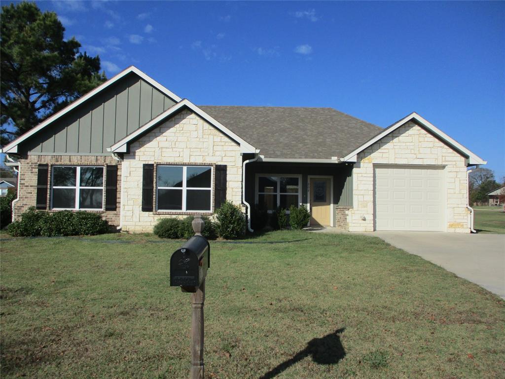 Move in Ready, Seller Financing will have you spending Christmas in this Bright, Open floor plan, 3-2-1 home on large corner lot with fenced back yard. Just minutes for schools, shopping, Lake Fork, Lake Tawakoni and much more.