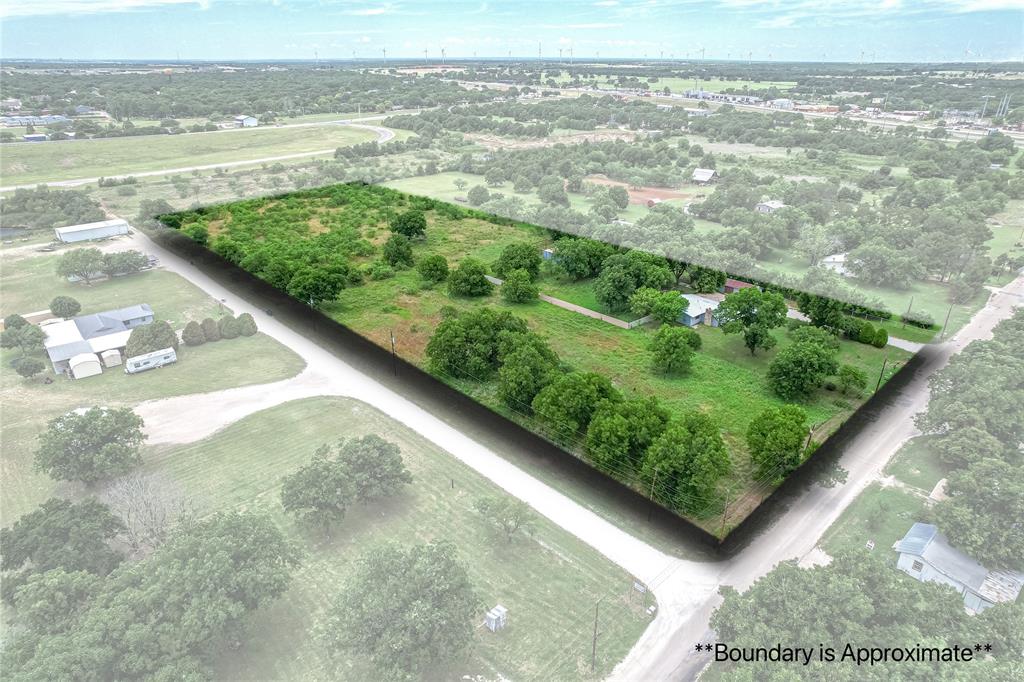 Discover the potential of this unique 6.05-acre property at 510 Hamby Road in Clyde, Texas. Offering the perfect blend of rural functionality and investment opportunity, this versatile property features a 3-bedroom, 2-bath farmhouse, perimeter and cross fencing, a barn, electric outbuilding, and infrastructure already in place for cattle, livestock, horses, or other agricultural uses.

The land is ready to go for ranching operations while also presenting endless possibilities for future development. Whether you're looking for a homestead, income-producing property, recreational retreat, or your next investment project, this property delivers flexibility rarely found this close to town. Enjoy the convenience of city water, sewer, electricity, and easy access to Clyde amenities while maintaining the privacy and freedom of country living.

With no known restrictions, investors and developers will appreciate the potential for subdivision, expansion, or redevelopment opportunities. The combination of acreage, existing improvements, agricultural usability, and proximity to town creates a highly desirable property with unlimited upside.

Bring your cattle, horses, investment vision, or development plans—510 Hamby Road is ready for its next chapter.