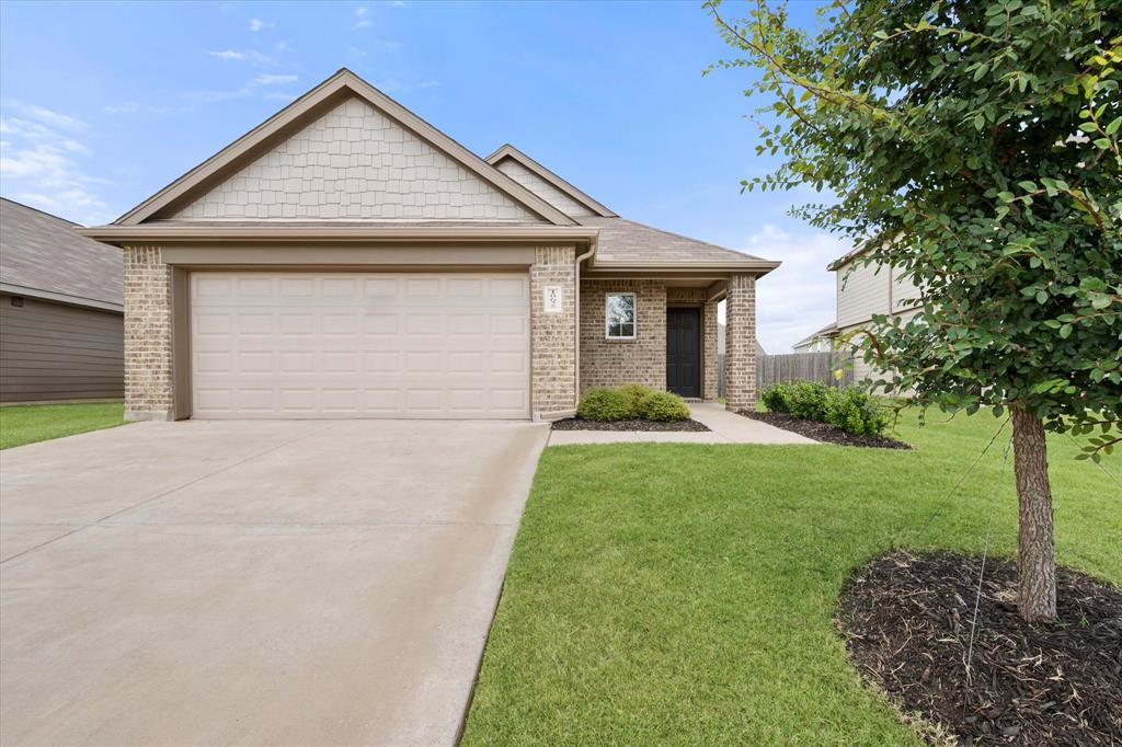 Welcome to this charming 2024-built single-story home offering 3 bedrooms, 2 bathrooms, and a spacious flexible open-concept floor plan designed for today's lifestyle. The well-appointed kitchen features 42-inch cabinetry, granite countertops, stainless steel appliances, and a large center island with breakfast bar, making it ideal for everyday living and entertaining. Retreat to the spacious primary suite with an expanded bay window, creating the perfect space for a cozy sitting area. Additional highlights include a tray ceiling, dual vanities with granite countertops, a garden tub, separate walk-in shower, and a generous walk-in closet. Luxury vinyl plank flooring extends throughout the main living areas. Generously sized laundry room offers a built-in drying rack and additional space for a second refrigerator or freezer. The thoughtfully designed split-bedroom layout provides added privacy, with two secondary bedrooms and a full bath located separately from the primary suite. Step outside to enjoy the covered patio overlooking the private backyard, complete with a full sprinkler system. Residents enjoy community amenities including scenic walking trails and a dog park, with nearby outdoor recreation at Benbrook Lake, Rocky Creek Park, and Bear Creek Campground. Conveniently located just minutes from shopping, dining, and entertainment at The Shops at Clearfork, Shops at Chisholm Trail, and Hulen Mall, with easy access to Chisholm Trail Parkway and I-35 for a quick commute to Fort Worth. Located within the highly regarded Crowley ISD. **** 3D walkthrough available on Zillow ****