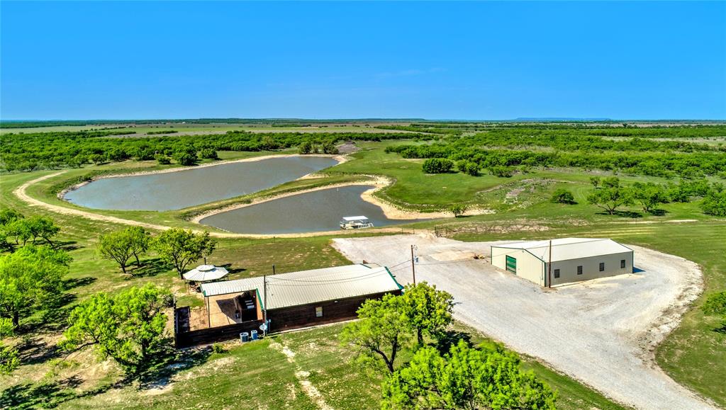 Outstanding hunting Ranch South of Santa Anna in Coleman County.   This offers approx 1187 ac of well manicured and perfectly thought out arrangement to sleep 47 people plus the foreman's home. This is an excellent private property or corp retreat, that is set up to perfection either way. Property offers,  Main home or foreman's house, main bunk house with living area and kitchen, shop with second bunk room, Party barn with outdoor kitchen, container for overflow sleeping. This ranch is set up and selling turn-key for Bird hunting, over 400 ac of natural wildflowers.Deer hunting, blinds and feeders are in place.Fishing, 6ponds and 1 lg lake with covered dock. 7 jeeps and 5 Kabota UTVs come with this property.