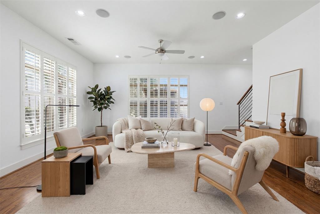 Welcome to this light filled corner unit townhome in the heart of the Medical District. This thoughtfully designed residence offers an open floor plan with 10 ft. ceilings, expansive windows, hardwood floors, and contemporary finishes throughout. Features include two bedrooms both with en-suite bathrooms, a powder bath, and dedicated flex space that can be used as an office, gym, or extra bedroom. The chef's kitchen opens seamlessly to the oversized living and dining areas, creating an ideal space for entertaining. Recently replaced HVAC system, freshly painted, and new carpet in the bedrooms make this home move-in ready. Conveniently located near UT Southwestern, Love Field Airport, Downtown Dallas, and great restaurants. Enjoy a low-maintenance, lock-and-leave lifestyle in a highly sought-after location.