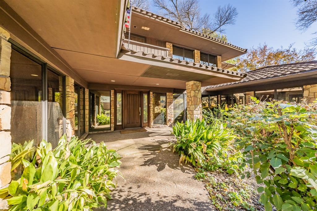 Discover this two stories, beautifully maintained 3-bedroom, 3.5-bathroom home in Overton Woods, one of Fort Worth’s most desirable neighborhoods, known for its top-rated schools and exceptional community appeal. Proudly owned by a single owner since it was built, this residence has been meticulously cared for and thoughtfully updated. Step inside to find an elegant, fully remodeled kitchen (2024) featuring brand-new appliances, custom cabinets, and stunning granite covering both the countertops and walls. A built-in refrigerator and a charming breakfast area make this kitchen as functional as it is stylish. Matching granite accents continue into the laundry room, creating a cohesive, upscale feel.
The home offers abundant living space, including a formal dining room, a spacious living room, a dedicated playroom, and a versatile office space—perfect for today’s work-from-home lifestyle. Expansive Pella windows and sliding doors fill every corner with natural light and provide beautiful views of the surrounding grounds. Enjoy outdoor living on the covered porch, ideal for relaxing or entertaining. The exterior and interior showcases gorgeous sandstone walls and columns, adding timeless character and impressive curb appeal. 
A durable Class 4 metal roof installed in 2019 offers both peace of mind and long-term value. With its thoughtful updates, quality craftsmanship, and prime location, this home is a rare opportunity for buyers seeking comfort, style, and lasting value in Fort Worth. Schedule your showing today!