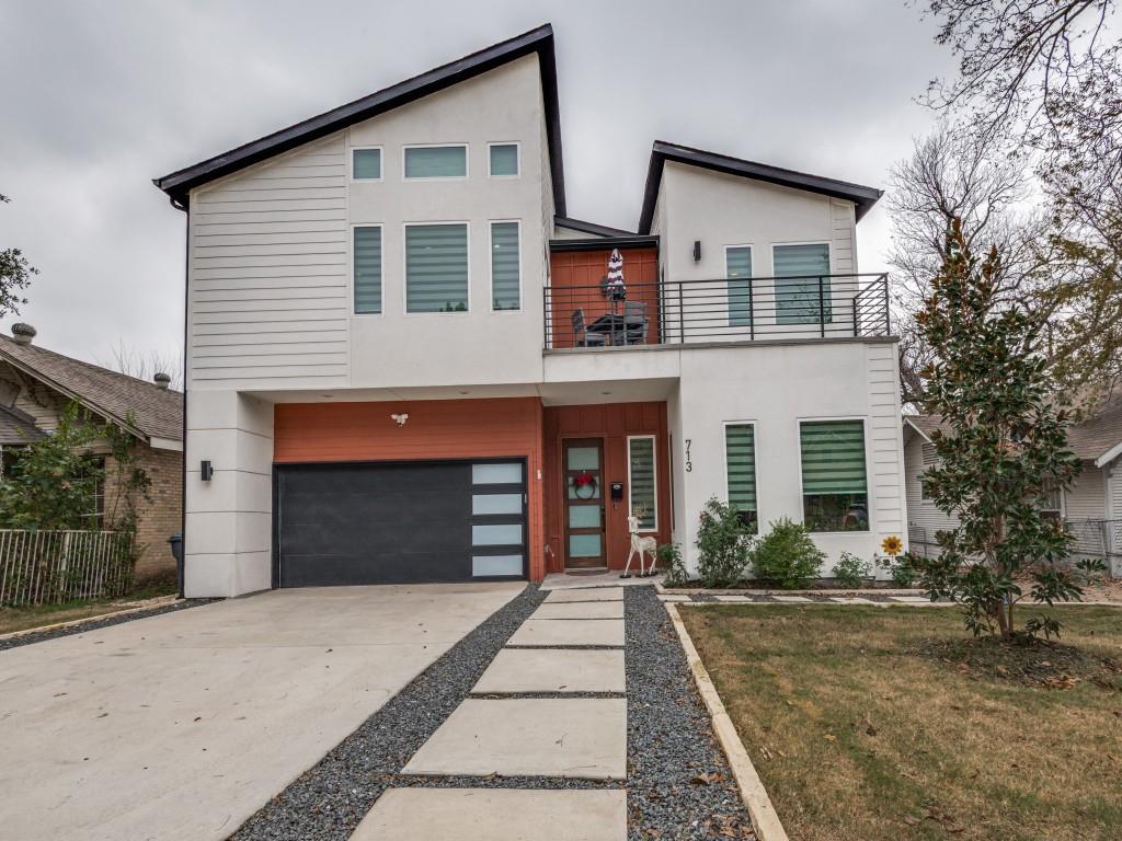 Built by Prestigious Homes and located near the Santa Fe Trail, this modern new construction offers a prime East Dallas location just minutes from Deep Ellum and Henderson. The open floor plan features soaring ceilings, a two-story living area, and expansive windows with custom window treatments that fill the home with natural light. Accordion glass doors lead to a covered patio and large backyard with a gated garden and plenty of room to add a pool. The stylish kitchen includes quartz countertops, a gas range, and generous storage, flowing seamlessly into the living and dining areas. Thoughtfully designed for flexibility, the home offers four bedrooms with en suite baths, a dedicated office, a guest suite on the main level, and a large upstairs flex space. The oversized primary suite features three walk-in closets, a spa-like bath, and a private balcony. A two-car garage and refined finishes throughout complete this well-appointed home. Yard also features custom irrigation system with fountain drip.