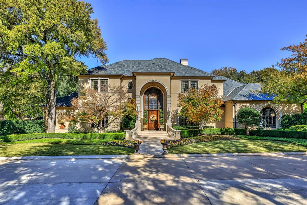 Custom built traditional home by Fred Parker in the guarded and gated Mira Vista golf course community. Extraordinary features are found throughout the interior, including 22 ft ceilings in entry, deep crown molding, rich hardwood, and slate flooring. Chefs’ kitchen with double ovens, gas range, built-in refrigerator, & dual dishwashers and sinks. Spacious primary suite with tons of windows and a cozy fireplace. Ensuite bath featuring dual vanities, separate shower, jetted garden tub, and exercise room! Dedicated study with rich built-ins and access to full hall bath. Upstairs there are four additional guest bedrooms, two with ensuite bathrooms. Game room with wet bar and balcony showcasing stunning views of the 15th green. The backyard was built for entertaining with a full outdoor kitchen, fireplace, fire pit, and water fountains with fire bowl. 3-car over-sized garage with huge storage closet.