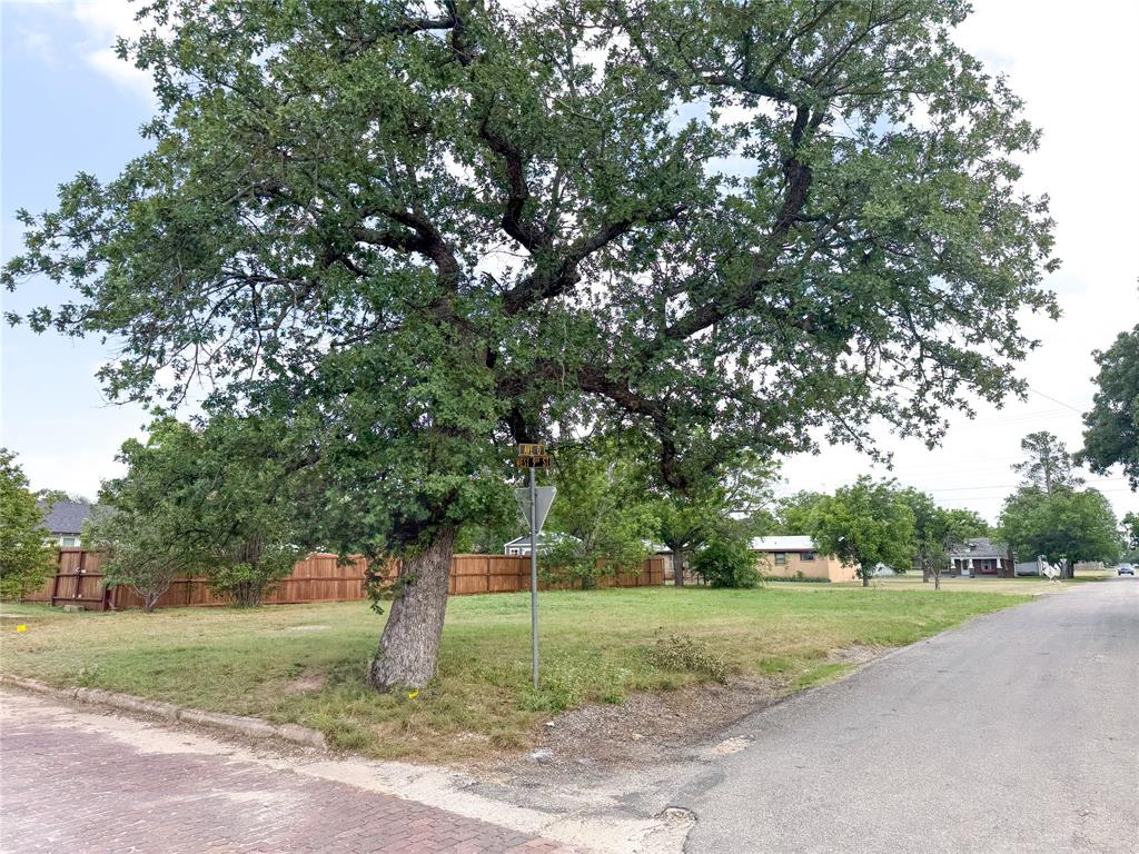 Situated on a corner lot in Cisco, TX, near both junior high & high school, this property offers a great opportunity to build your custom home.  Located just over a mile from Interstate 20, enjoy small-town living with only a 45 minute drive to Abilene or a 90 minute drive to Fort Worth. Whether you’re ready to build now or planning for the future, this lot is worth a look.