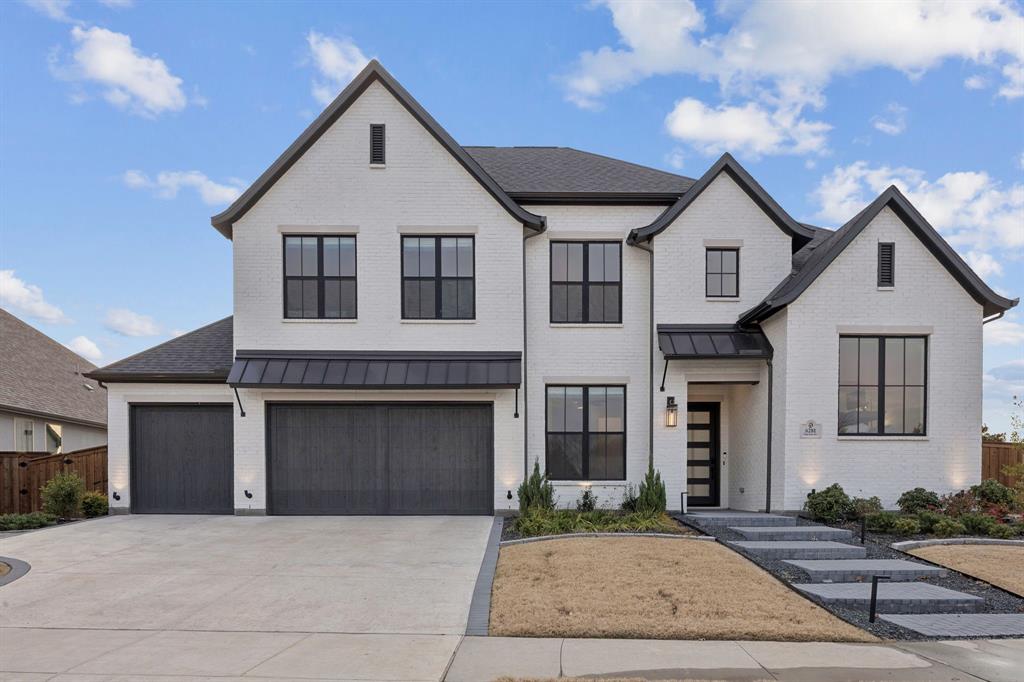 Rare opportunity in one of Frisco’s most prestigious neighborhoods. This is the only brand-new luxury home available in the established enclave of Edgestone at Legacy South, situated on a premium 0.37-acre corner lot with greenbelt views and featuring the highly sought-after Shaddock Lakeway floor plan. At this price point and level of features, this home is not expected to last.
Completed in 2025, the home offers 5 bedrooms, 5.5 bathrooms, and over $100K in upgrades, with a layout ideal for both everyday living and entertaining. Soaring ceilings throughout, including a dramatic vaulted cathedral ceiling in the living room, create a bright, open atmosphere. A wall of expansive windows and sliding glass doors showcases stunning sunrise and sunset views while seamlessly connecting indoor and outdoor living.
The chef’s kitchen features an 8+ foot waterfall island, stainless steel appliances, and abundant cabinetry. A flexible room off the kitchen can serve as a prep kitchen, oversized pantry, gym, secondary office, or craft room. The main level includes 2 bedrooms and 2.5 bathrooms, perfect for guests or multigenerational living. Upstairs are 3 additional bedrooms, each with a private bath, plus a game room and media room. A dedicated office between floors overlooks the greenbelt.
Extensive storage is found throughout. The oversized 3.5-car garage fits 3 vehicles plus a golf cart or provides workshop and storage space. The expansive backyard offers room for a pool, sport court, or putting green, while the covered patio includes a fireplace and built-in grill for year-round outdoor living.
Ideally located across from the community pool, fitness center, playground, and trails, just 4 minutes from Legacy Christian Academy and 8 minutes from The Star, with easy highway access. This home perfectly blends luxury, location, and lifestyle—an opportunity not to be missed.