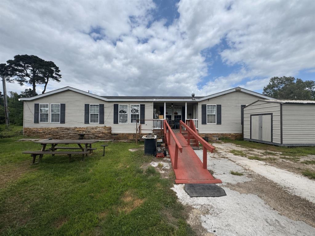 This 2006 built 3-bedroom, 2.5 bath mobile home with approximately 2,304 sq ft sits on 2.5 acres with a creek. It offers privacy and long-term potential and country living. The manufactured home does need some repairs BUT all of the major systems are in great shape. The roof was replaced in 2016, the HVAC is new, plumbing and electrical are in solid condition. ARV is $180,000. The property is being sold as is with plenty of upside. Strong tenant base in Shreveport metro tenant pool: Barksdale AFB, LSU health, Willis Knighton, and casinos all within a 30-minute drive. The rent floor is anchored by jobs that are not going anywhere.