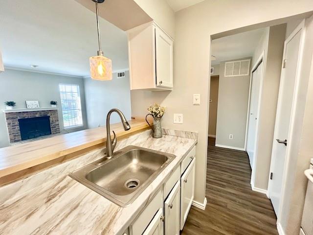 Prime North Dallas Condo in Plano ISD with Major Mechanical Upgrades! This turnkey, east-facing residence features a brand-new HVAC (2024) and an updated electrical panel (2025), offering total peace of mind for the next owner. Inside, enjoy seamless luxury vinyl plank flooring throughout and a crisp neutral palette. The open-concept layout flows into a fully equipped kitchen complete with an included refrigerator and microwave. Relax in the oversized primary bedroom featuring a large walk-in closet, or step outside to your private patio with built-in storage. Complete with assigned parking space #309 and access to the community pool. Unbeatable location just minutes from Central Market, UTD, top-tier shopping, dining, and major highways. Ready for immediate move-in!