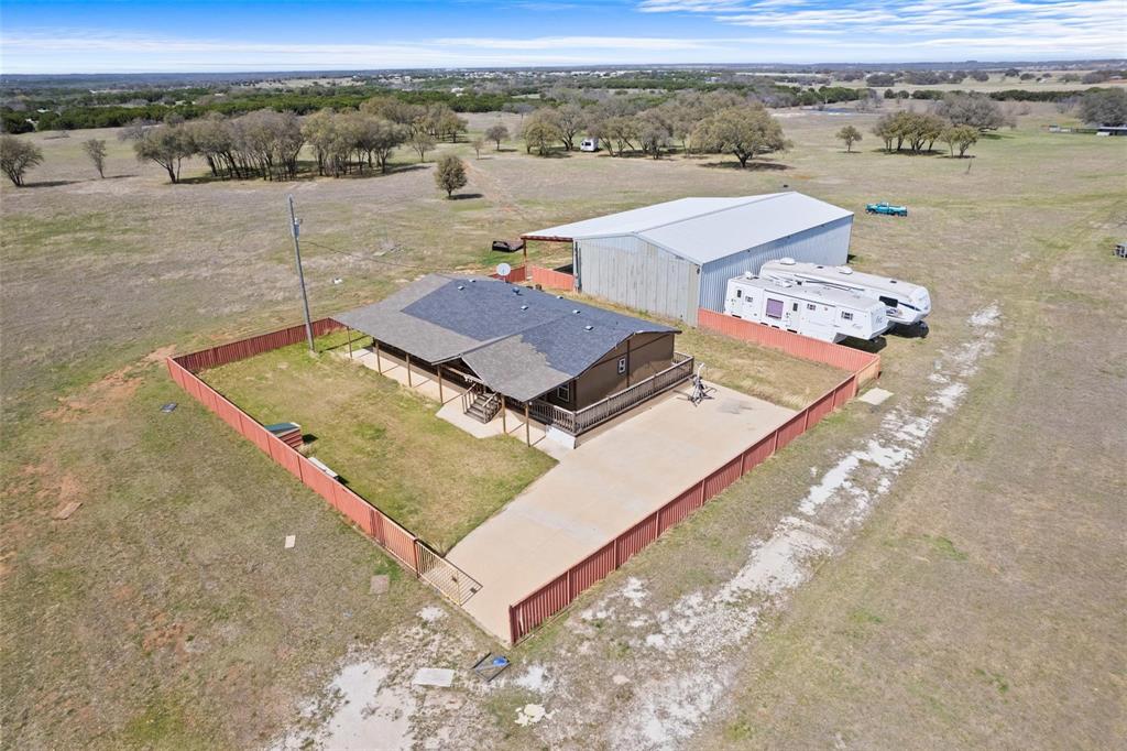 HUGE PRICE ADJUSTMENT!!! ...........AMAZING OPPORTUNITY!!! Only one of its kind in Whitney.... Do as your heart
desires with 76 ACRES! Perfect location and there is a cozy mobile home on property, ready for you to add your own
personal touch! Mobile home was placed there about 5 years ago and workshop was built on property around the same
time. **Workshop has water and electricity!** Ideal location, close to town and Lake Whitney but nestled in quiet
community. Don't miss out!