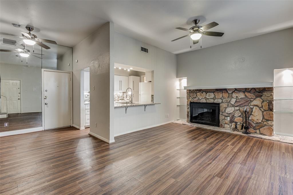 Tastefully updated town home right off of Oak Lawn Avenue! Nice and open living room with laminate wood flooring, great natural light, and stone FIREPLACE. Updated kitchen includes granite counters, newer cabinets, fridge, dishwasher, oven range and built in microwave. Half bath off kitchen and ONE CAR ATTACHED PRIVATE GARAGE WHICH HAS ACCESS FROM THE PRIVATE GARAGE DIRECTLY INTO THE LIVING QUARTERS. Full size washer and dryer included in garage. Large bedroom upstairs with good closets and en suite bath, complete with private balcony. Tenant pays electric only. Community pool on site! The unit is only 1 of 22 total units, making for more privacy and exclusively, rather than a larger residential complex.