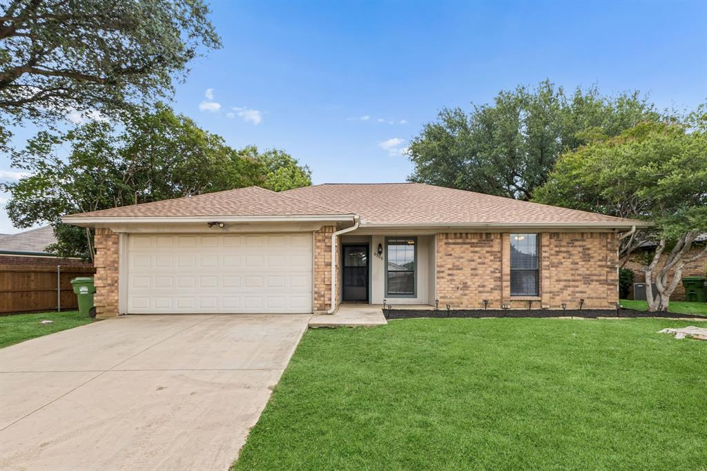 Nestled in an established neighborhood, this inviting 3-bedroom, 2-bath home combines comfort, functionality, and a prime location with easy access to downtown Fort Worth, the Alliance Corridor, DFW Airport, and highly rated Keller ISD. The open-concept floor plan is anchored by a cozy family room featuring a beautiful brick fireplace, creating the perfect gathering space. Just off the living area, the breakfast nook features a bright bay window and flows seamlessly into the kitchen for easy everyday living and entertaining. The split-bedroom layout offers added privacy, with the spacious primary suite tucked away from the secondary bedrooms. Fresh paint and ceiling fans enhance every bedroom, while the primary bath has been refreshed with a new vanity. Step outside to enjoy the patio overlooking a private, oversized fenced backyard with plenty of room for entertaining, pets, or play.