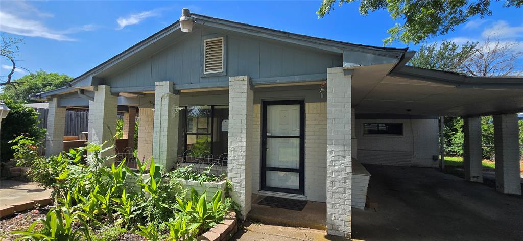 Just minutes from the heart of historic downtown Mineral Wells, this unique property offers the space, flexibility, and convenience that are becoming increasingly difficult to find. Situated on just under an acre along Palo Pinto Highway, this 3-bedroom, 3-bath home combines country-style breathing room with quick access to restaurants, shopping, schools, and the growing energy of downtown Mineral Wells.

The property is designed for both everyday living and entertaining, featuring expansive covered outdoor spaces, a built-in outdoor kitchen, and plenty of room to gather with family and friends. The oversized covered parking area and dedicated RV parking provide exceptional flexibility for travelers, hobbyists, boat owners, or anyone needing extra space for vehicles and equipment.

Surrounded by mature trees and set on a generously sized lot, you'll enjoy privacy and room to spread out while remaining close to everything Mineral Wells has to offer—from the Baker Hotel revitalization and downtown events to nearby Possum Kingdom Lake, Lake Mineral Wells State Park, and the area's growing recreation and tourism scene.

Whether you're looking for a primary residence, weekend retreat, or a property with room for your RV and outdoor lifestyle, 8295 Palo Pinto Highway delivers the space, location, and versatility to make it your own.