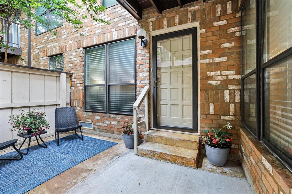 First-floor convenience and exceptional value await! The HOA covers all utilities plus valet trash, making this an outstanding opportunity. Beautifully updated and meticulously maintained, this spacious condo features an open floor plan that lives even larger than its square footage.

Set within a charming mid-century modern community, residents enjoy mature trees, lush landscaping, a sparkling pool. This desirable first-floor unit offers two separate entrances, with the front entrance featuring a private patio, perfect for morning coffee, container gardening, or relaxing outdoors as well as two assigned parking spaces. 

Inside, a stylish kitchen with granite countertops, stainless steel appliances, and seamless flow into the inviting living area, complete with a cozy wood-burning fireplace. Storage is abundant, with walk-in closets, built-ins, and a dedicated laundry room with additional storage. Refrigerator, washer and dryer will convey with acceptable offer. 

Two generously sized bedrooms and two full baths provide comfort and flexibility. Ideally located just minutes from Central Market, Greenville Avenue's popular restaurants and shops, White Rock Lake, SMU, and convenient access to US-75 for a quick drive to Downtown Dallas. Move-in ready and an incredible value in a prime location!