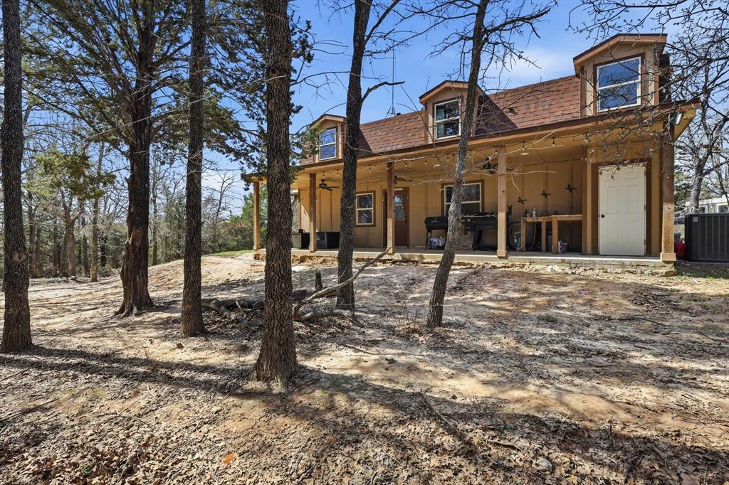 Rare opportunity to own 5 wooded acres in Alvord, Texas featuring a unique barndominium surrounded by mature trees, natural privacy, and scenic North Texas countryside. This beautiful property includes ponds, creating a peaceful setting ideal for relaxing and enjoying the wildlife that frequent the area. The beautifully wooded acreage provides plenty of space for outdoor recreation, gardening, animals, or simply enjoying the quiet of rural living. Properties like this offer the freedom and space many buyers are searching for while still being within convenient driving distance of everyday amenities. Outdoor enthusiasts will appreciate being near the Lyndon B. Johnson National Grasslands, offering miles of natural landscape for hiking, horseback riding, wildlife viewing, and seasonal hunting opportunities in accordance with applicable regulations. The area is also known for charming countryside destinations including nearby wineries, making it easy to enjoy scenic drives, tastings, and relaxing weekend outings. Located a short drive from Decatur, this property offers the perfect balance of country living, wooded acreage, ponds, and access to outdoor recreation. If you are looking for space, privacy, natural beauty, and a barndominium lifestyle, this Wise County property is one you will want to see.