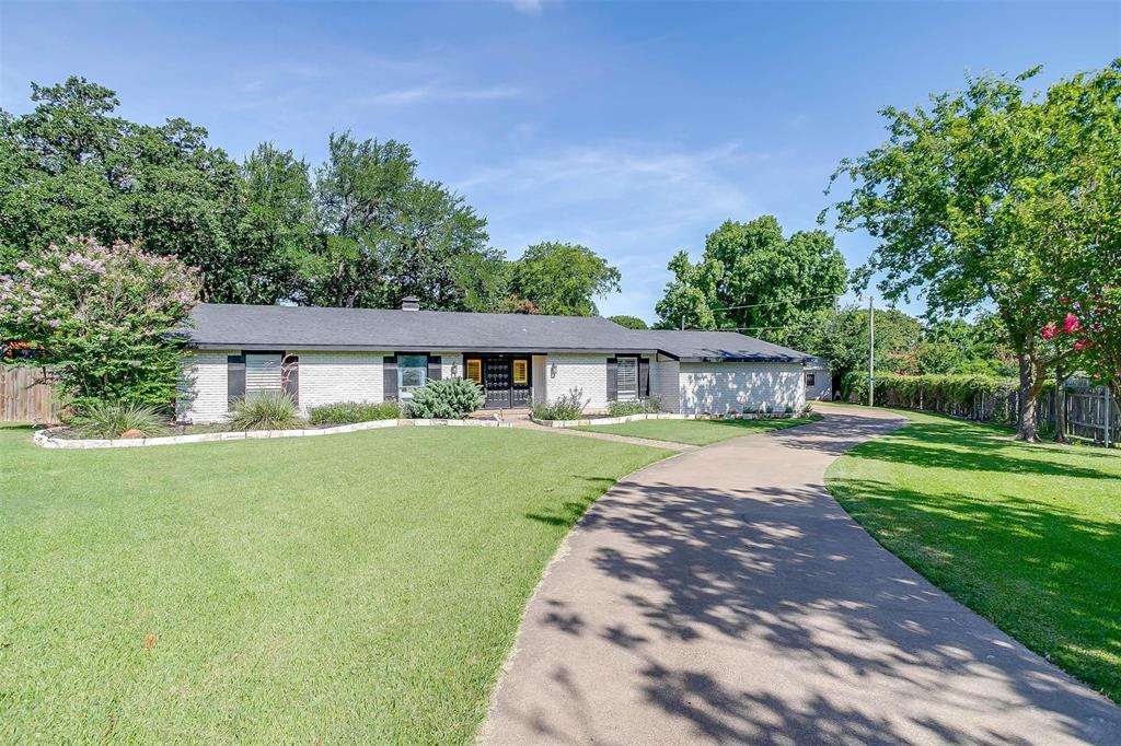 Welcome to this charming ranch-style retreat in Burleson with no HOA & room to breathe. This beautifully maintained home is nestled on over half an acre on a quiet cul-de-sac street. Built in the 1970s, this spacious one-story gem offers modern conveniences and no HOA restrictions. Featuring 3 generously sized bedrooms, 2.5 bathrooms, and a versatile office or flex space, this home provides plenty of room for both relaxation and productivity. The eat-in kitchen opens to the heart of the home, while a wet bar adds the perfect touch for entertaining. You’ll love the oversized garage, workshop, and RV parking, making it ideal for hobbyists and adventurers alike. Inside, you’ll find plantation shutters, tons of storage, and a sunroom with a built-in Jenn-Air grill, perfect for family gatherings. The private, tree-filled backyard offers peace and serenity, with a storage building and plenty of space to roam, garden, or play. Located in the highly desirable Burleson ISD, this home offers a rare opportunity to enjoy country-style living with city convenience. Don’t miss this opportunity to own a piece of classic Texas charm in an unbeatable location!