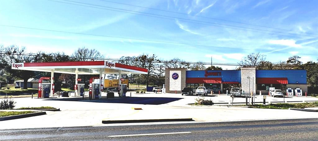 Please Do Not speak to employees about the property or any details, contact Listing agent directly. Fully operational EXXON gas station,built and opened just over 12 months, Owner,Operator, so no tenant lease in place. Nice fuel canopy with 4 Pumps (8 MPD's),commercial kitchen, customer walk-in Beer & Wine cooler. Corner location with great visibility on a busy highway. Located across thestreet from the Trane HVAC Manufacturing Plant in Tyler, employing around 2600 people and a 23,000 Vehicle car count. Ready to gofor any new Owner,User or Investor.