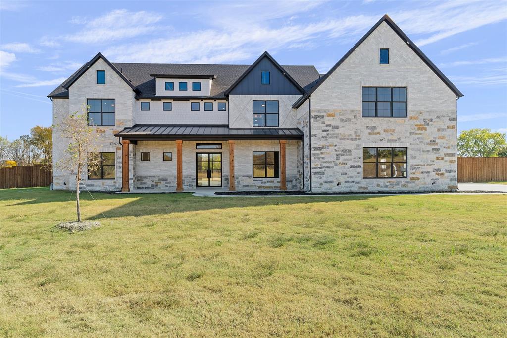 The Rushmore plan from the Cope Homes Luxury Series. This beautiful craftsman style home is located in the newest 1+ acre lot community in Princeton, Hidden Valley I. This home features a large open floorplan, two story ceilings, and an oversized 4 car garage. The kitchen features quartz countertops, Bar with Beverage Fridge, Kitchen Aid double ovens, gas cooktop, dishwasher and two large kitchen islands. First floor primary bedroom is oversized and features a seating area. The ensuite bath has a free-standing tub and dual shower heads in the walk-in shower. Other features include an office and large laundry room. The second floor has three bedrooms, two and a half baths, a game room with wet bar, and separate media room. A large multi-slide glass door opens to the covered patio with a wood burning fireplace. NO HOA! Add your own shop, apartment, storage on the 1+ acre lot! If this isn't your floorplan, we have several other homes currently under construction in Hidden Valley I! All information is deemed reliable, but not guaranteed.
