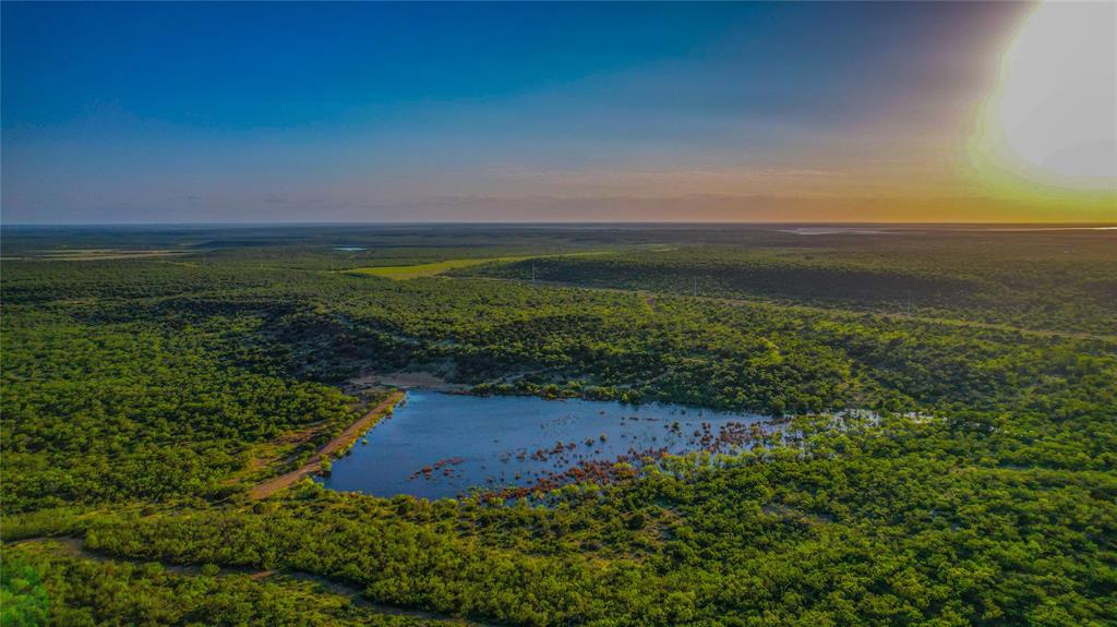 Discover the 4AJ Ranch, an exceptional 845-acre recreational haven nestled in the southwestern part of Coleman County just minutes from Lake O.H. Ivie. Consisting of native brush and varied terrain with up to 180 feet of elevation change, this property offers privacy and seclusion while being conveniently accessible via FM 1929. Enjoy the natural beauty and abundant wildlife, with easy access to amenities in nearby communities like Brady and Brownwood. This represents a rare opportunity to own a meticulously maintained, turn-key, recreational property with abundant wildlife, scenic vistas, 6 earthen tanks, a 3-Acre Lake and modern comforts. Well appointed and fully furnished, 4 bedroom, 3 bath rock home with covered outdoor living space and a 716 sq.ft. guest quarters.  Whether you seek a weekend retreat or a year-round sanctuary, this ranch offers unparalleled potential. Don’t miss your chance to experience the beauty and tranquility of Texas ranch living.