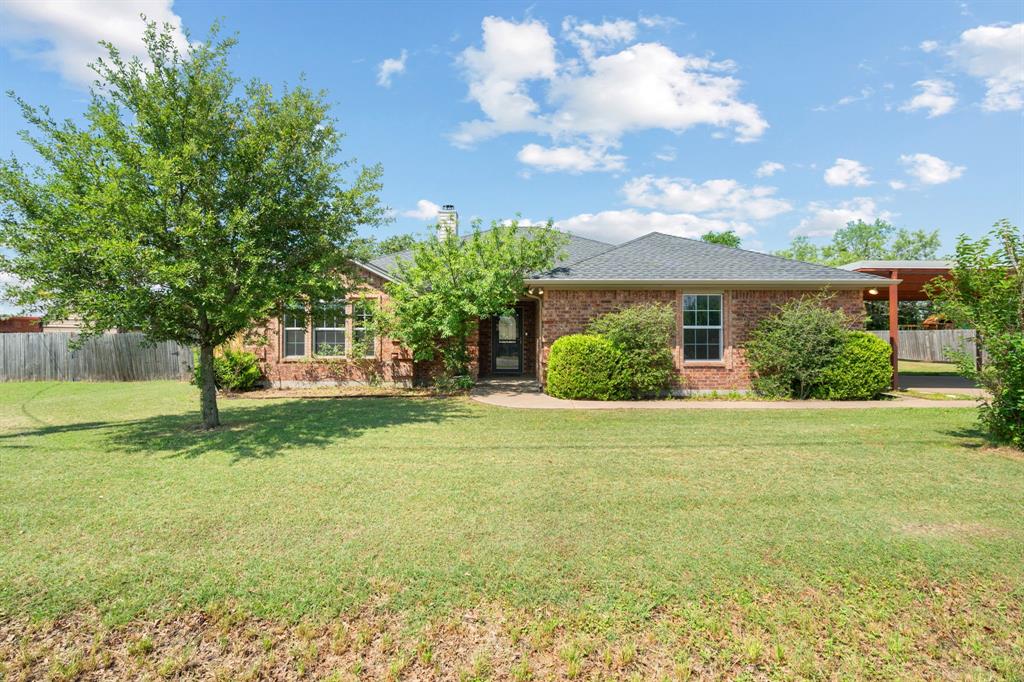 Charming Granbury home situated on a spacious corner lot in an established neighborhood just minutes from Lake Granbury and the historic Granbury Square. This 3-bedroom, 2-bath home offers an inviting layout with comfortable living spaces, abundant natural light, and plenty of room to enjoy both indoors and out. The property features a large yard, mature trees, and a peaceful setting while still being conveniently located near shopping, dining, schools, and entertainment. Whether you are looking for a primary residence, weekend getaway, or investment opportunity, this home offers incredible potential in a desirable Granbury location.