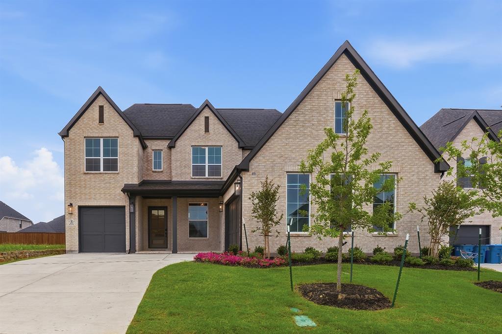 The Wellington is a new open concept design inspired by our beloved model plan, the Huntington. This exceptional home features a stunning light brick exterior with an inviting front porch, five bedrooms, four and a half baths, a private study, a media room, and a three car garage. The soaring 20 foot ceilings in the family room and dining area create a dramatic space filled with natural light. The chef’s kitchen showcases custom white cabinetry, an Iron Ore painted accent island, light quartz countertops, and double ovens. The primary retreat offers a spacious bathroom with a freestanding tub, an oversized walk in shower, and his and hers closets. A secondary bedroom is located downstairs with a private en suite. Additional luxury features include gorgeous nail down hardwood flooring in focal areas, upgraded black plumbing fixtures, and designer lighting throughout. Located in the highly sought after Homestead community, residents enjoy easy access to I-30, no MUD or PID, a low HOA, and a brand new resort style pool with cabanas. Come discover why The Homestead continues to be one of the area’s most desirable places to call home.