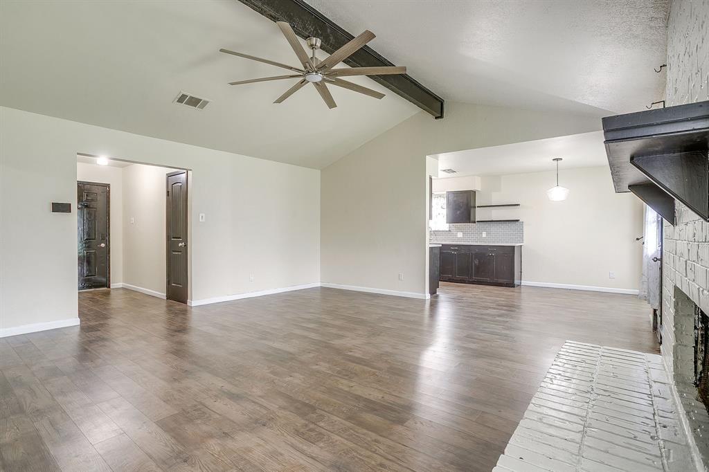 Charming 3-bedroom, 2-bath brick home in a quiet Fort Worth neighborhood featuring a bright open-concept layout perfect for everyday living and entertaining. The spacious living area with a cozy wood-burning fireplace flows seamlessly into the kitchen and dining space, complete with granite countertops and ample storage. Enjoy a large backyard with plenty of room to relax or create your ideal outdoor space, plus a 2-car garage for added convenience. A great opportunity for comfortable living in a convenient location!