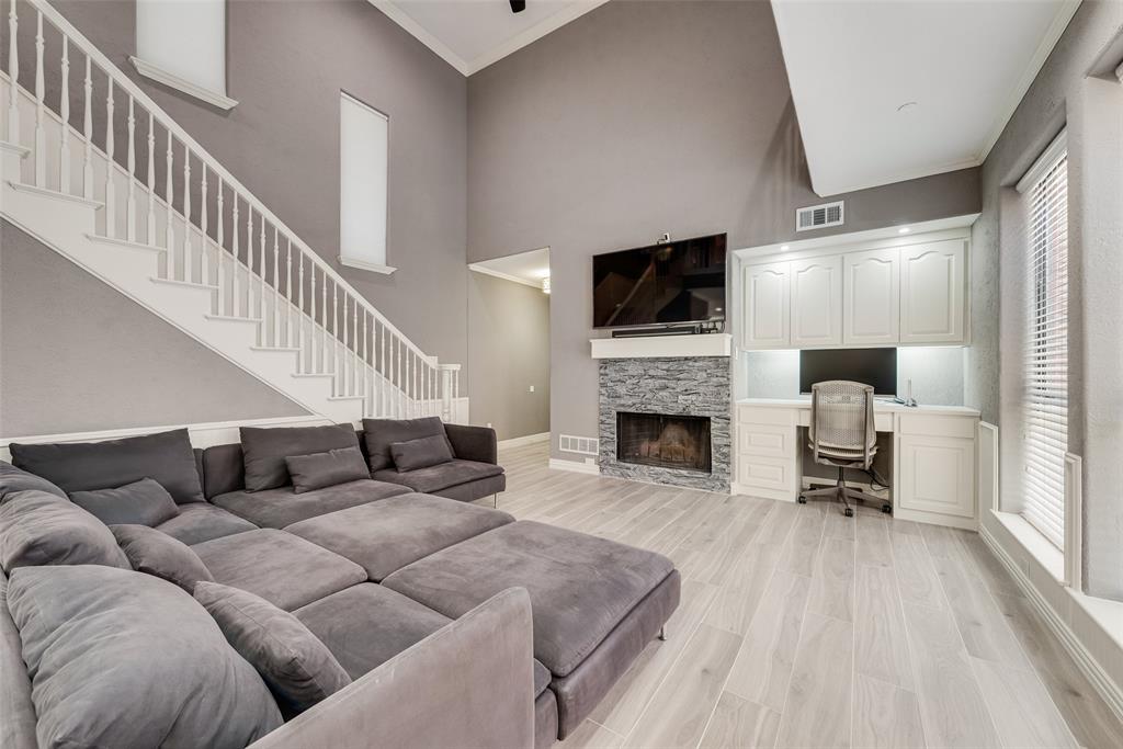 Located in the highly desirable Addison Place subdivision, this stunning 3-bedroom, 3-bath patio home offers an exceptional floorplan, prime corner lot location, and outstanding access to Addison amenities, plus walking distance to Trinity Christian Academy. This two-story home is move-in ready and beautifully updated in April 2026 with all new interior paint and replacement flooring throughout. The versatile 3-way split bedroom layout includes a downstairs bedroom and full bath, while upstairs features a huge primary suite plus a large secondary bedroom with private bath that could easily serve as a second primary suite. Vaulted ceilings and abundant natural light enhance the spacious feel of the home. The kitchen is designed for both daily living and entertaining with quartz countertops, double ovens, built-in microwave, electric cooktop, large breakfast bar, abundant cabinetry, and adjoining dry bar with wine refrigerator. The living area features a beautifully redesigned stone-front woodburning fireplace and easy access to the private patio from both the kitchen and living room. Ceiling fans are located in all bedrooms, the primary bath, and living room. The spacious primary suite offers a jetted tub, separate shower, dual vanities, and large walk-in closet with modular closet system. Featuring an extensive Smart Home system that includes Ecobee smart thermostats (ask for complete list). Ideally located in the center of the neighborhood with the community pool, clubhouse, and courtyard area directly behind the home. North Addison Park, featuring over 3 acres and a half-mile walking-jogging trail, is just a short half-block away. Addison residents enjoy membership to the Addison Athletic Club for a one-time $10 fee. Excellent location with easy access to the Dallas North Tollway, George Bush Turnpike, LBJ Freeway, and Addison’s renowned dining and entertainment district. Complete list of updates and other available items is available.