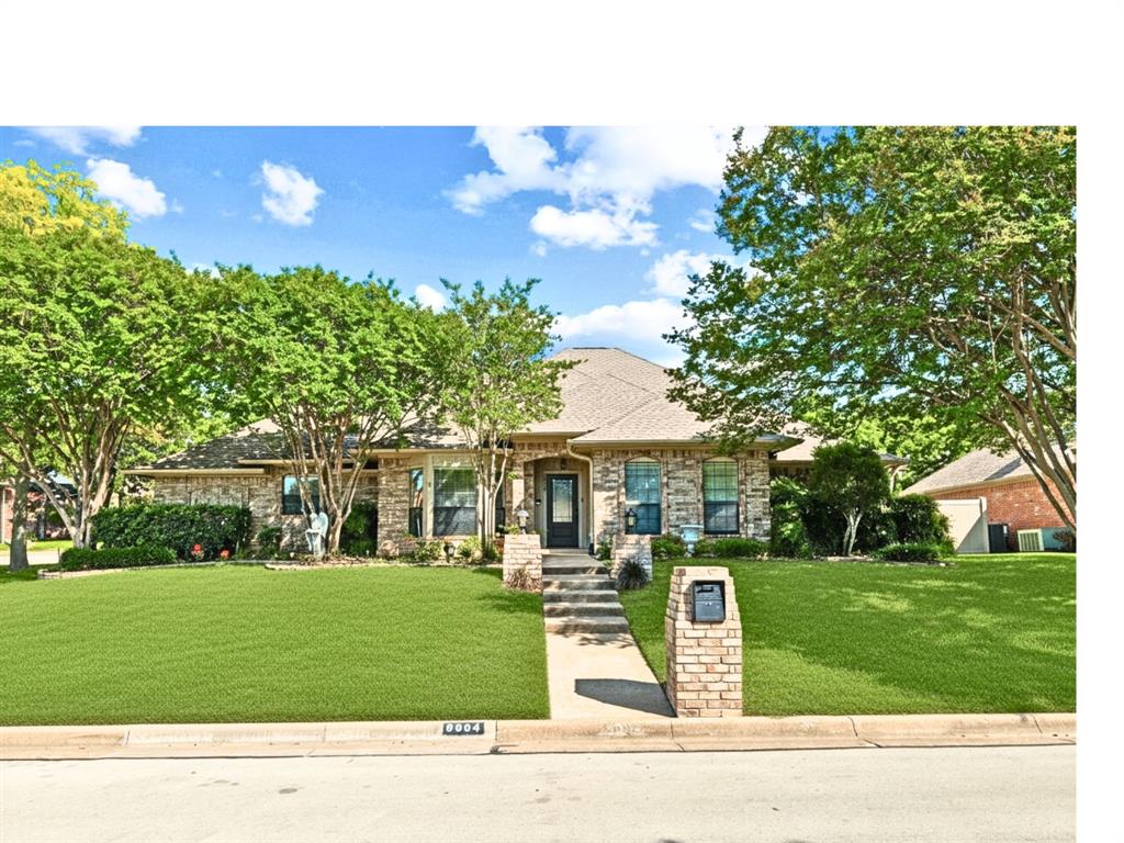 Welcome to prestigious Waterwood Estates! Established, Secluded and Tranquil living with NO HOA! Enjoy scenic tree-lined streets, well maintained homes, gentle rolling hills, and a short walk to Lake Arlington and Richard Simpson Park. This hidden gem sits on an interior corner lot with lush landscaping, full sprinklers, newer roof and gutters, private backyard, oversized 2 car garage and 3-car parking pad. Home blends timeless 1980s architecture with contemporary touches. Neutral tones, spacious rooms, and a flexible layout suited to a variety of lifestyles. 4 generously sized bedrooms (2 down, including primary, 2 up), spacious game room up ideal for teens or guests offering both comfort and versatility.
Inside, you’ll find 3 living areas, 2 fireplaces, a bright sunroom, a walk-out balcony with spiral staircase, abundant storage, and a private, pet-friendly backyard. The main living room welcomes you with a cozy fireplace and seamless flow, while a concealed staircase and catwalk provide a unique architectural touch—perfect for showcasing art. The formal dining room connects effortlessly to the chef’s kitchen, the true heart of the home--include Abundant natural light, Brick-accented cooking area, Double stainless oven, Oversized island, Extensive cabinetry, built-ins, and wide drawers, Custom pantry with hidden lazy Susan, Breakfast nook with scenic views. The spacious family room_den features hardwood floors, a large bay window seat, and a full wet bar—ideal for entertaining. Additional conveniences include direct garage access, a separate laundry room, and a guest powder bath.
The primary suite is impressive in size and comfort, a cozy brick fireplace, sitting area, sunroom access, and serene backyard views. The en-suite offers Dual Vanities, Granite Countertops and Seating area, Separate Shower, Jetted Tub, Skylight—Expansive walk-in closet_ built-ins. 
This exceptional property combines character, space, and location—Must See! SOME IMAGES VIRTUALLY STAGED.