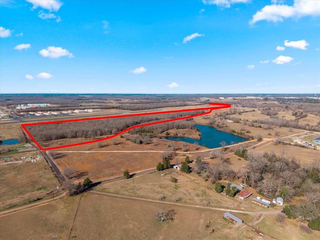 APPROX 50 ACRES, THIS PROPERTY HAS 3 TRACTS ALL TOGETHER.  PROPERTY IS NEXT TO AIRPORT