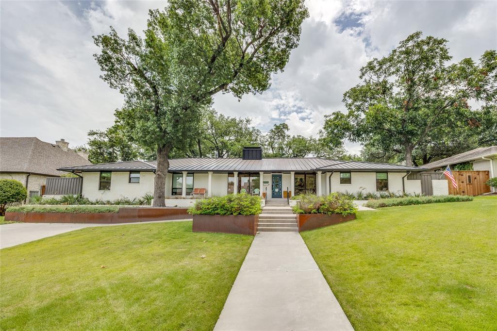 Situated on an oversized, exceptionally private lot in the highly coveted Janmar Circle neighborhood, this one-of-a-kind residence has been completely reimagined with custom design and luxury finishes throughout. Every room has been thoughtfully renovated, creating a home that is both timeless and effortlessly functional.
At the heart of the home features raised ceilings and an expanded kitchen featuring custom cabinetry, striking terrazzo countertops, a built-in True refrigerator, and designer finishes that seamlessly blend beauty with everyday living. The spacious primary suite was thoughtfully expanded to create a luxurious spa-inspired bath and private retreat, while the enlarged laundry room, beautifully remodeled bathrooms, and custom wine storage add both style and convenience.
Designed for exceptional indoor-outdoor living, the backyard showcases a custom designed pool, expansive deck, covered outdoor living area, and professionally designed landscaping that transforms the property into a private oasis. 
Additional highlights include two generous living areas, a attached two-car garage with an electric privacy gate, plus an added front driveway providing additional parking for guests. Every detail of this remarkable home has been carefully curated, offering an opportunity to own a truly turnkey luxury property in one of Dallas' most sought-after neighborhoods.