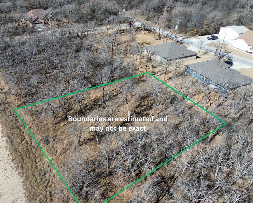 MOTIVATED SELLER !! Picturesque quarteracre lot located in Runaway Bay, offering the perfect canvas to build your dream home on a quiet cul-de-sac. The property is partially cleared while still preserving mature trees that provide shade and a peaceful, natural setting filled with birds and wildlife.
The lot is level and buildable, with neighboring homes already established.  City water and sewer are available at the street. Please note: mobile homes are not permitted. Just minutes from Runaway Bay’s recreational amenities, including boat docks, a public swimming pool, and community parks. The town hosts year-round events such as 4th of July, Christmas, and Easter celebrations. Conveniently located between Bridgeport, Weatherford, and Jacksboro, with quick access to shopping, dining, and more.