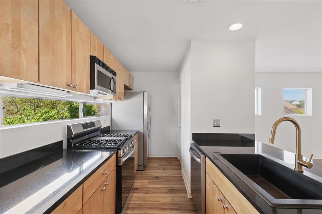 Located in one of the most vibrant areas of Dallas, this stunning three-story townhouse offers the perfect blend of modern living and thoughtful design. Featuring 2 bedrooms, 2 full bathrooms, and an attached 2-car garage, this home is move-in ready and packed with upgrades. Inside, enjoy scratch-resistant wood flooring throughout! The open-concept main level impresses with soaring ceilings, a fireplace, and tons of natural light. The kitchen is both beautiful and functional, equipped with granite countertops, stainless steel appliances, and a built-in water purification system. Head upstairs to the top-floor primary suite where you’ll find the ultimate retreat — complete with a spa-like soaking tub, oversized closet, and all the privacy you could ask for. The covered patio area offers a cozy spot to relax. With exciting new developments all around, this location offers unmatched access to shopping, dining, and entertainment. Also available for lease — don’t miss your chance to live in the heart of it all!