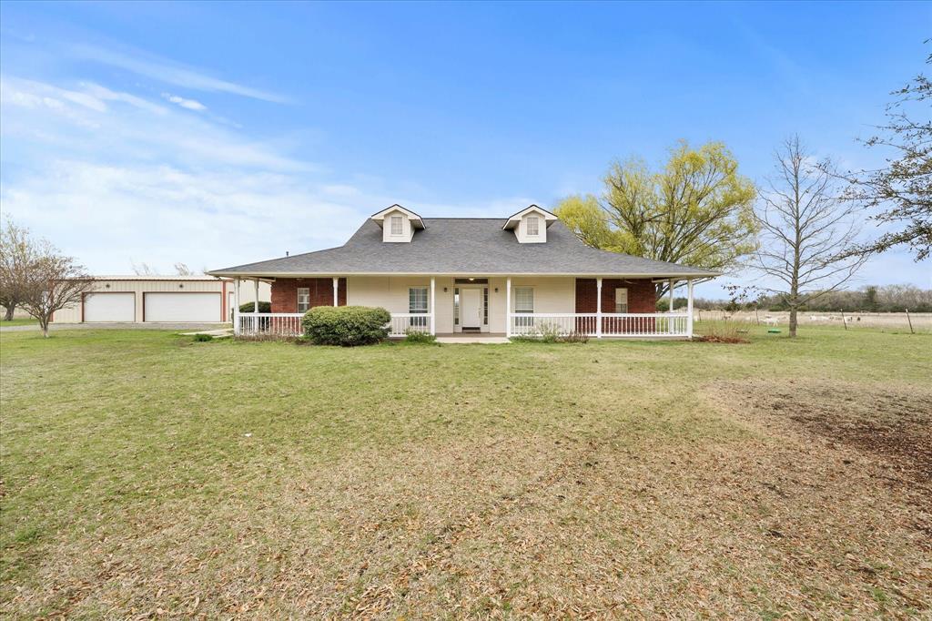 Discover the perfect blend of tranquility and space with this stunning Farm and Ranch property nestled in Leonard, TX. Offering three bedrooms, two baths, and a sprawling 3-car garage, this residence is set on 5+ acres that promise privacy and endless possibilities.
Step inside to an open floor plan where style meets function. The home is adorned with luxurious vinyl plank flooring throughout the main living areas, providing durability and charm, while plush carpet adds warmth to the bedrooms. The heart of the home features a brick wood-burning fireplace with a gas starter, perfect for cozy evenings. The spacious kitchen is a chef’s dream, equipped with a gas cooktop, built-in microwave, and oven, making meal preparation a joy. Retreat to the expansive primary suite, a true haven with his and her closets, a garden tub, and a walk-in shower that promotes relaxation and ease. The exterior of this property is equally impressive with front and back covered patio for relaxing. The property includes a three-bay shop, ideal for car enthusiasts or as a versatile space for hobbies and storage. Whether you are looking for a peaceful retreat from city life or an expansive property to cultivate your dreams, this Leonard homestead offers a rare opportunity to live amidst nature’s splendor while enjoying modern amenities. Bring your animals and call this property Home! 
Buyers and buyers agents to verify all details within.