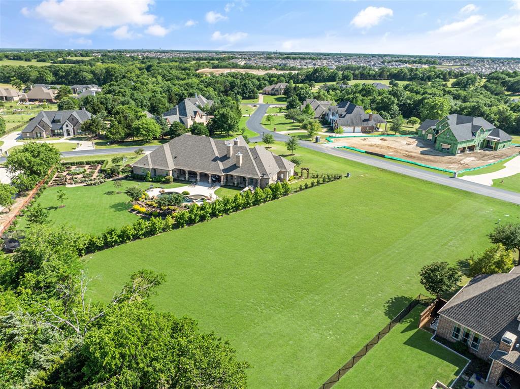 Discover the perfect setting for your custom dream home on this stunning 1-acre home site. Situated within the prestigious 680-acre gated community of Waterstone Estates, this exclusive enclave offers luxury country living at its finest—without city property taxes! With no required timeline to build and the freedom to bring your own builder, you can create a home that perfectly creates your vision of lifestyle and comfortability. Waterstone Estates boasts exceptional amenities, including four small lakes, tranquil ponds, a private covered fishing pier, a lakeside park, a soccer field and a basketball court. Enjoy the perfect balance of privacy and convenience, just under 11 miles from downtown McKinney, 9 miles from McKinney National Airport, 24 miles from Legacy West's amazing dining and entertainment venues and only 23 miles from The Star in Frisco. So many opportunities to create a once in a lifetime of experiences and quality of life.