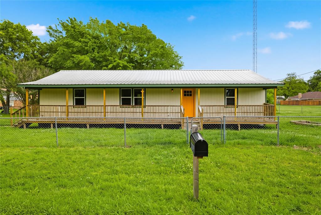 Welcome home to this 3-bedroom, 2-bath property situated on approximately 0.41 acres within the city limits, offering the perfect combination of comfort, functionality, and outdoor living. From the inviting covered front porch to the fenced backyard, this property provides the space and versatility today's buyers are looking for. Inside, you'll find a practical floor plan designed for everyday living, with comfortable living spaces and electric appliances ready for daily use. Step outside and enjoy the back deck, perfect for grilling, entertaining, or relaxing with family and friends. The fenced yard provides room for pets, gardening, and outdoor activities, while the existing chicken coop adds a unique bonus for those interested in fresh eggs or hobby farming. One of the standout features is the impressive 30x30 shop with two 10-foot bay doors, ideal for storing vehicles, equipment, boats, recreational toys, or creating the ultimate workshop. An additional carport and storage shed provide even more space for storage and organization. Conveniently located near schools, shopping, dining, and everyday amenities, this property offers the benefits of in-town living while still providing room to work, play, and pursue your hobbies. Outdoor enthusiasts will appreciate being less than 30 minutes from Cooper Lake State Park, known for fishing, boating, camping, hiking, and other recreational opportunities. L3Harris is also approximately 40 minutes away, making commuting a viable option. Properties offering a home, shop, storage buildings, fenced yard, and versatile outdoor space at this price point are increasingly difficult to find. Schedule your showing today and see everything this property has to offer.