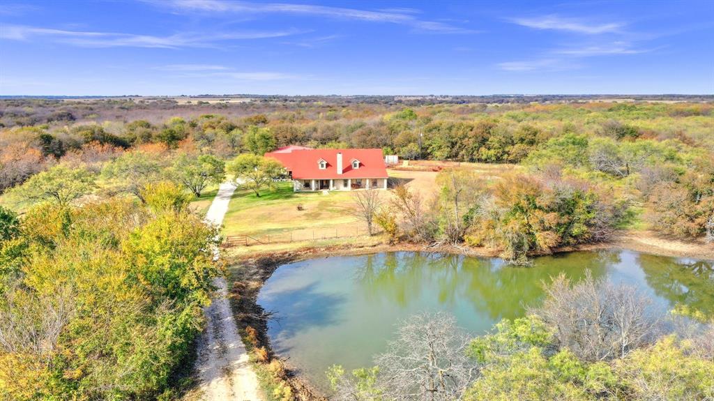 Welcome to Shearer Road Ranch, a stunning 30 acre net property between Celina and Pilot Point. This picturesque ranch, located on Shearer Road, offers endless possibilities for those seeking an expansive and private retreat. dotted with majestic trees, Shearer Road Ranch boasts a prime location between Pilot Point and Celina. This ideal positioning provides easy access to FM 1385 and the DNT, as well as the convenience of being located north of the outerloop area. Included on the property is a beautiful 3,300 sf home, perfect for those looking for a comfortable and luxurious living space. Additionally, the ranch features a well-maintained barn and fenced areas, making it ideal for cattle, crops, and livestock. With a diverse landscape and abundant natural beauty, this land offers countless opportunities for agricultural use or development. property is unzoned, allowing for flexibility in potential uses. Extra 50 ac that is in the flood to be deeded at closing at no cost. 83 ac total.