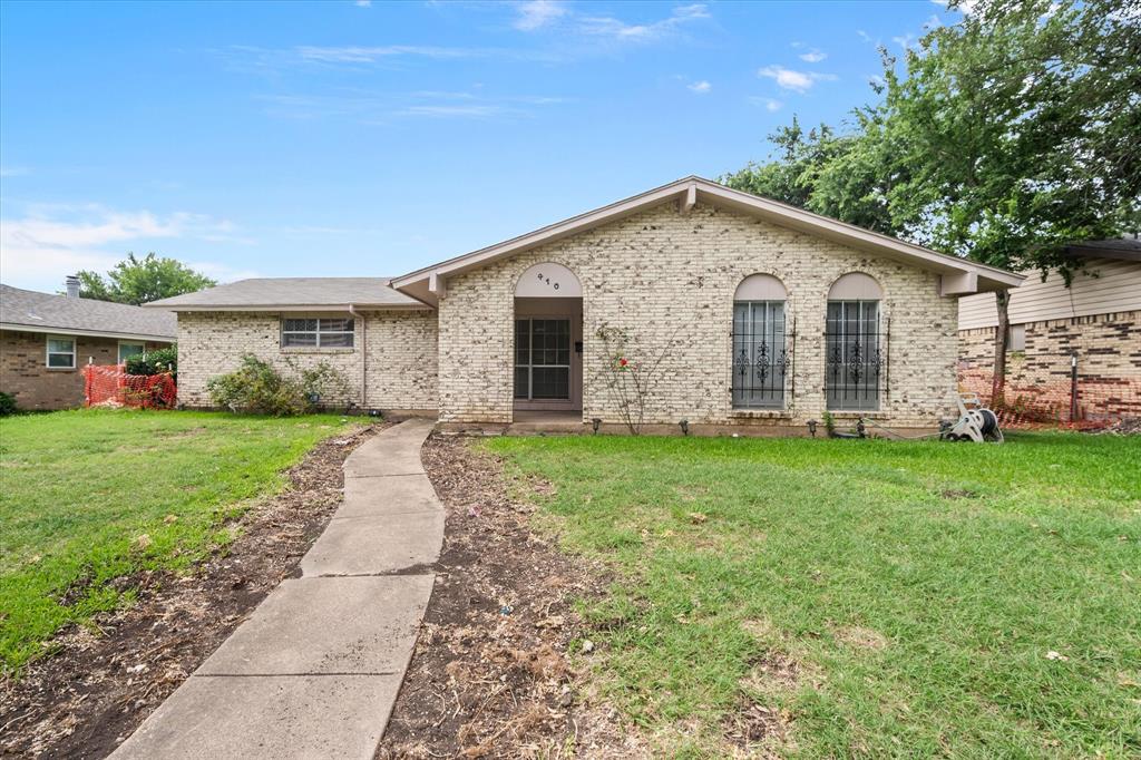 Nestled in Duncanville’s established Candlelight Estates, this single-story brick home is full of potential and ready for your personal touch. A welcoming, oversized covered front porch creates an inviting first impression and excellent curb appeal. The interior features a bright and airy living room bathed in great natural light. Nearby, the spacious kitchen offers plenty of cabinet storage and a large, comfortable eat-in area. Fresh paint gives the entire home a clean, vibrant feel, beautifully complemented by new, durable vinyl plank flooring that delivers the look of wood with zero maintenance hassle. The practical layout hosts a peaceful primary suite with a private ensuite bath, alongside two additional bedrooms that share a full hallway bathroom. Out back, you will find a massive, fully fenced yard ready for pets, play, or gardening, as well as a rear-attached two-car garage with convenient alley access. With no HOA to restrict your vision, you have the total freedom to customize this space exactly as you please. Best of all, you are located in the Duncanville ISD, close to local shopping, dining, and schools, with quick access to Highway 67 for an easy commute to downtown Dallas.