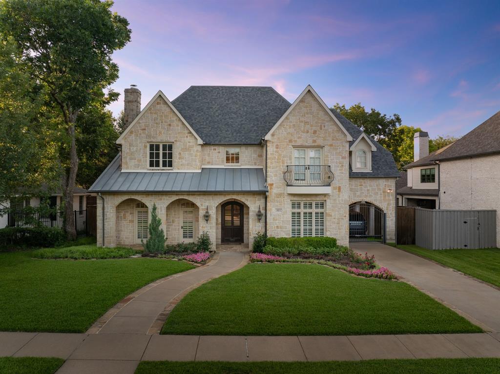 Lovely custom built home by Wes McKenzie located in highly sought after Preston Hollow. Upon entrance you are greeted with a grand staircase, hand scraped wood floors, chandelier and a study with built in cabinets and a fireplace. The beautiful gourmet kitchen features a Wolf gas range, Sub-Zero fridge, double dishwashers, butler’s pantry, wet & breakfast bars and opens into the dining area and living room. The spacious master suite upstairs has a luxurious bathroom with double vanities, jetted tub and large walk-in closet. 3 additional bedrooms have their own en-suite baths and walk-in closets. A bonus room has a closet and can be used as 5th bedroom or upstairs office. Entertainment room has a microwave and room for mini-fridge, great for movie night! Large utility room with built-in cabinets and sink. Covered porch with fireplace, TV hookup and gas grill. Covered parking for 3 including an oversized garage with front & rear access to the house through a gated porte-cochere or back electric gate. Home is also listed for lease MLS#: 21267274.