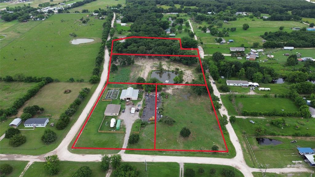 Beautiful 3-acre tract featuring an abundance of mature trees and natural shade, offering the perfect setting to build your dream home or place a manufactured home. With no known restrictions, you have the freedom and flexibility to create the lifestyle you envision. Imagine yourself enjoying the peace and privacy of country living on this scenic property. The pound adds to the charm of the property and has been enjoyed for recreational fishing by the owners. The pond also serves as a natural water source for horses and local wildlife, enhancing the tranquil country atmosphere. An added benefit is the flexibility of access, with road frontage allowing for entry from either side of the property, providing the opportunity to create two separate entrances if desired. This is an unimproved tract with no utilities currently installed. Looking for additional acreage? The adjacent 2-acre tract is also available for purchase under MLS #21298384, providing an excellent opportunity to expand your property or create a larger homesite. Sewer service is not available, and buyers will need to install a septic system and verify the availability and cost of utility services to the property. Buyer and buyer's agent to perform their own due diligence regarding utilities, availability of services, and development requirements.