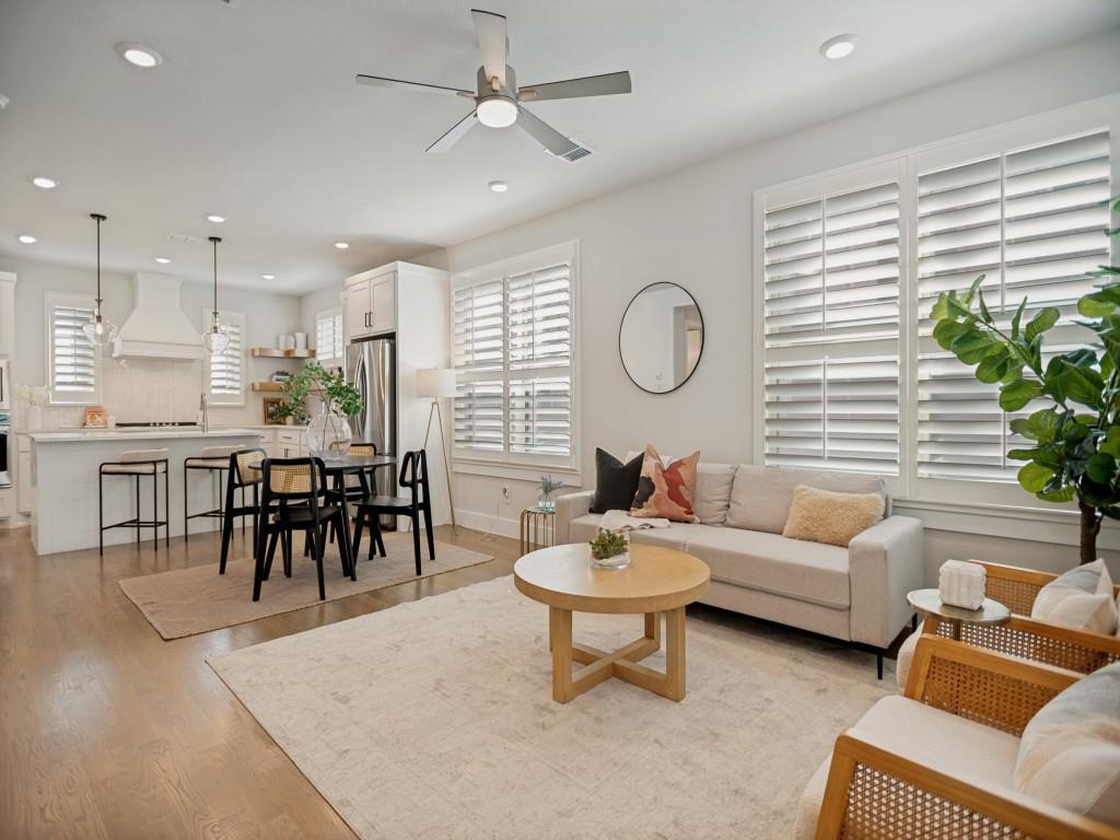 Impeccably maintained, stunning corner-unit townhome offers four levels of sophisticated living with unobstructed downtown Dallas skyline views. With a low monthly HOA, this lock-and-leave residence combines luxury, convenience, and exceptional value.
The main living level features an open-concept design filled with natural light, highlighted by a beautiful brick fireplace and a chef's kitchen complete with like-new LG appliances, a 5-burner gas cooktop, custom vent hood, walk-in pantry, oversized island, and designer herringbone tile backsplash. Plantation shutters throughout the home add timeless style and privacy.
The third floor hosts a spacious primary suite with a walk-in closet and spa-inspired bath, while the secondary bedroom features its own ensuite bath and serves perfectly as a guest suite, nursery, or private home office.
Designed for entertaining, the fourth-floor bonus room includes a dedicated dry bar area with space for a wine refrigerator, custom cabinetry, and shelving. Step outside to the oversized rooftop terrace where you'll enjoy breathtaking, unobstructed views of the Dallas skyline along with additional rooftop storage.
Additional highlights include a private attached two-car garage, mudroom entry, video security system, and a prime location just minutes from Downtown Dallas, Lower Greenville, Knox-Henderson, and some of the city's best dining, shopping, and entertainment. This exceptional home truly feels like new construction without the wait.