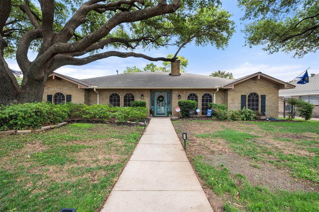 Spacious 4-bedroom, 3-bath single-story home with sparkling in-ground pool in a highly desirable South Arlington neighborhood. Beautiful curb appeal with mature trees, lush landscaping & rear gated drive. Formal living & dining rooms flank the entry—formal living features a ceiling fan and is ideal for a home office, while the dining room offers easy kitchen access.  The updated kitchen boasts painted cabinetry, granite countertops, tile back-splash, smooth cooktop, double convection ovens, pantry & refrigerator included with an acceptable offer. The breakfast area is highlighted by a tray ceiling with beams & unique curved wall of windows overlooking covered patio & pool.  Spacious main living area features a vaulted ceiling with 2 skylights, gas fireplace with modern glass and stone accents, built-in shelving, tile flooring & large ceiling fan. The private primary suite is located at the rear of the home with patio access and an en-suite bath featuring a barn door entry, dual granite vanities, oversized jetted garden tub with pool views, separate shower & 2 walk-in closets.  Secondary bedrooms are well-sized. Bedrooms two and three share a Jack-and-Jill bath with an updated oversized shower, while the fourth bedroom is split and includes a private full bath—ideal for guests or multi-generational living.  The converted garage offers abundant lighting, wet bar and rear driveway access—perfect for a workshop, craft room or bonus living space. A separate utility room accommodates oversized appliances and includes built-in cabinetry & extra storage.  Outdoor living shines with a large covered patio featuring two ceiling fans, overlooking fenced in-ground pool (pump replaced in 2025, pool timer-dual with cold sensor replaced Jun 26) & nicely landscaped yard. Additional highlights include a storage shed with electricity including 220 & RV plug ins, solar screens, plantation shutters and a new HVAC system installed in May 2026. Move-in ready & waiting for a new owner!
