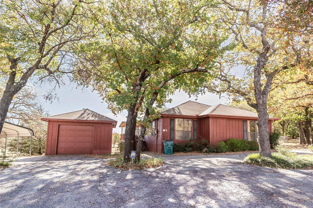 ONWER FINANCING AVAILABLE. Beautiful golf-course home in the gated community of Nocona Hills. Enjoy serene gold-course living in this inviting home located inside the highly sought-after, gated community of Nocona Hills. Positioned right on the fairway, this property offers peaceful views and a relaxed, resort-style feel. Inside, the home features a spacious layout with multiple living and dining options, including a breakfast nook, separate formal dining room, dedicated office, and a wet bar perfect for entertaining. The large primary suite includes two walk-in closets and an ensuite bathroom with dual sinks for added comfort and convenience. The kitchen is equipped with all-new appliances installed in Decemeber 2024, including a dishwasher, refrigerator, and a range. Refrigerator, washer, and dryer will convey, making this home move-in ready. This property combines comfort, functionality, and a prime golf-course setting-an ideal retreat in a secure, peaceful community. Must have Realtor to access gated community.
